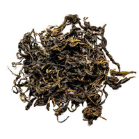 Ein ansprechendes Foto von unserem Grünen Tee Curly Green in loser Form.