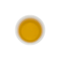 Ein ansprechendes Foto von unserem aufgebrühten BIO Kräutertee Get.Up.Now in einer Tasse.