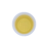 Ein ansprechendes Foto von unserem aufgebrühten Oolong Tee Midnight Monk in einer Tasse.