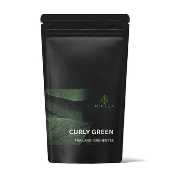 Ein ansprechendes Foto unserer Teeverpackung für den Grünen Tee Curly Green.